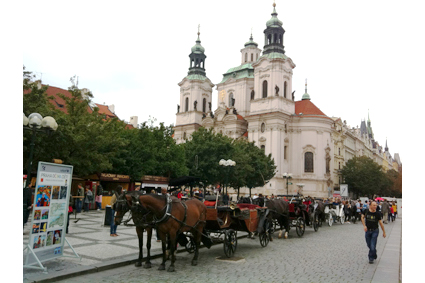 Horse-drawn carriages add to Prague